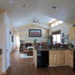 This Athens Park Homes Classic Model features Blue Ponderosa Pine in the living room - available through Recreational Resort Cottages and Cabins in Rockwall, Texas
